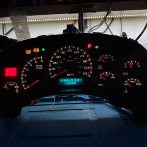 Vehicle dashboard displaying mileage