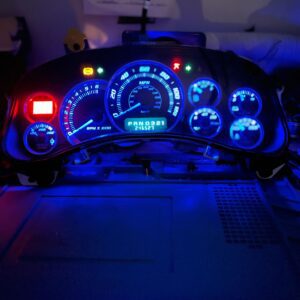 Glowing vehicle instrument panel at night