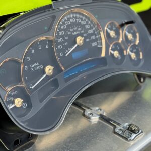 Car dashboard with speedometer and gauges