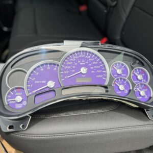 Purple speedometer on car seat