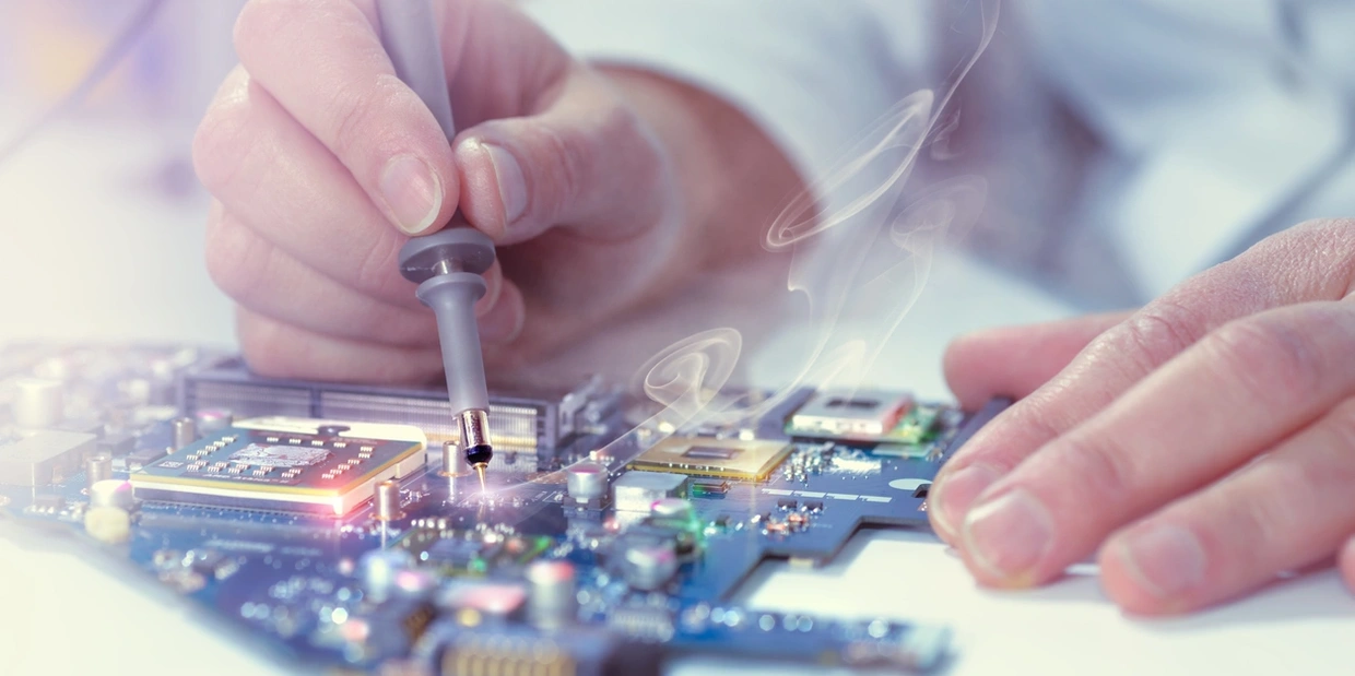 Hands soldering circuit board components